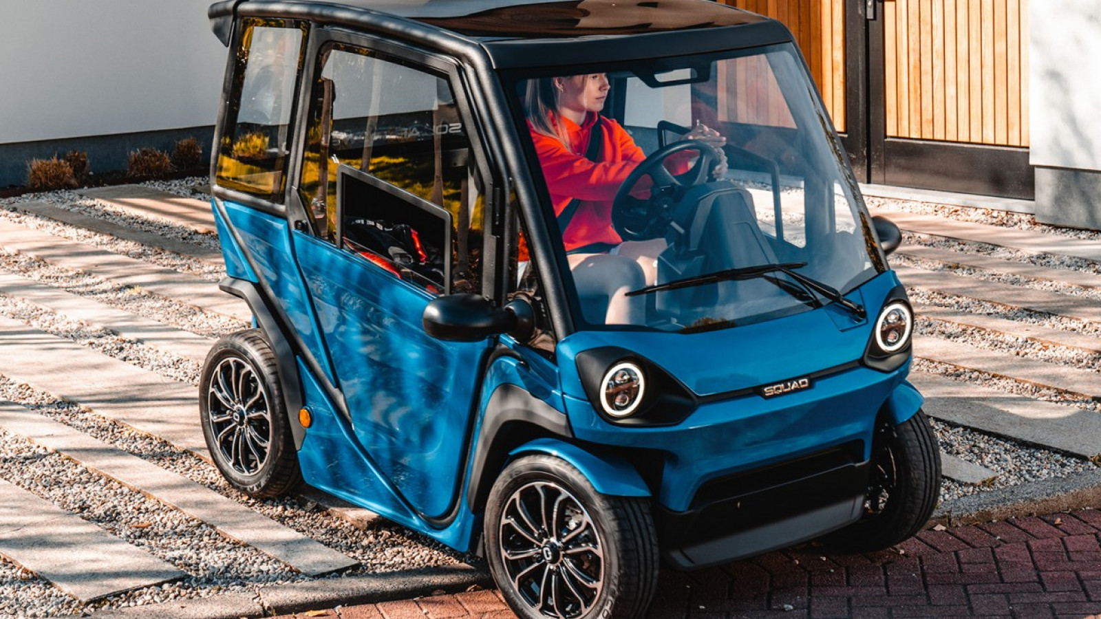 this super-narrow electric car looks like an odd adult-sized toy